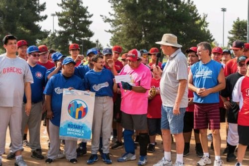 Rotarian Jeff Werner gives $500 to the Love Them All Foundation on behalf of the Chino Rotary Club